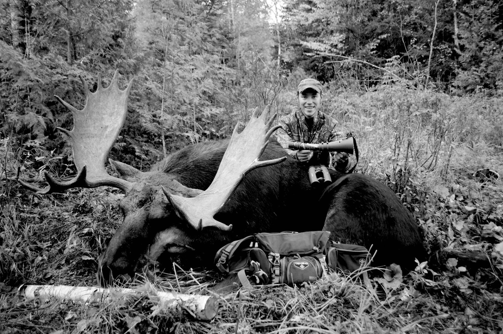 A man riding on the back of an animal.