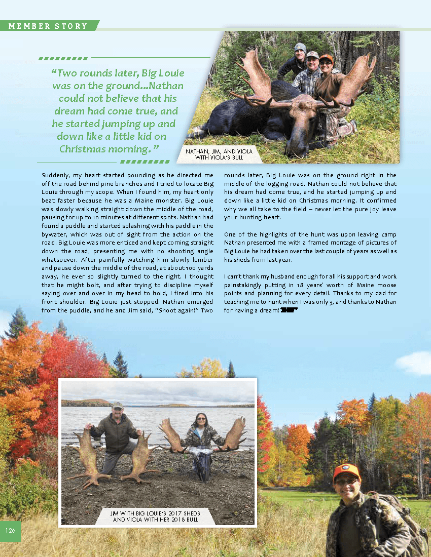 Two hunters with a harvested moose.